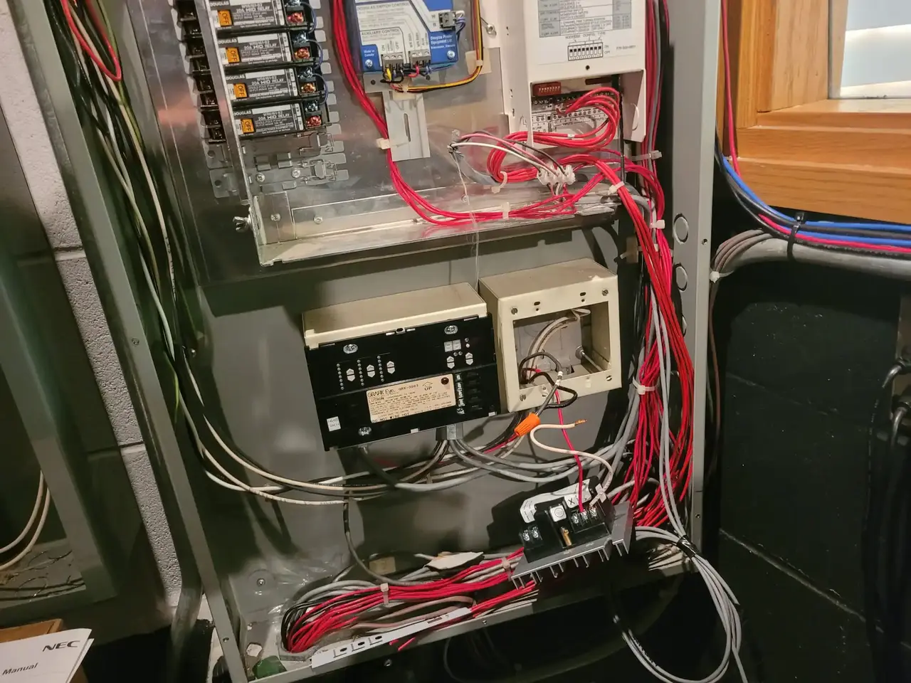 an electrical panel in a home with wiring